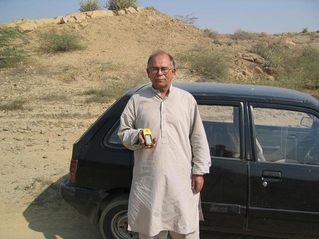 My father holding the GPS