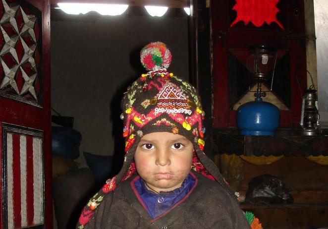 We were invited in for tea and the owner of the house coaxed one of his little girls out for a photo.  She wasn't too happy about it though.