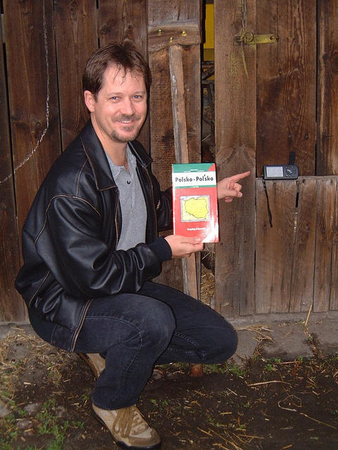 Mark Pautz at the closest point to the confluence (it's just on the other side of the barn door).