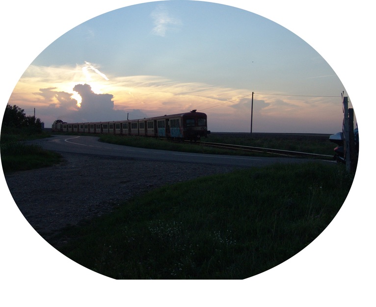 Sunset at the railroad crossing in Ketfel