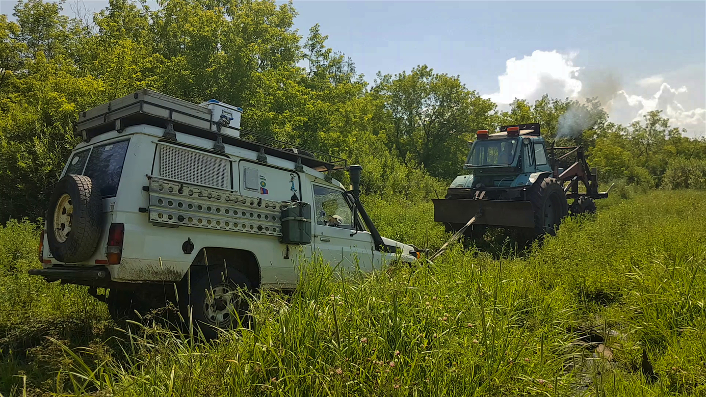 #7 Tractor saves Toyo from Tartarian swamp