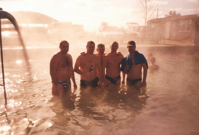 Traditional confluence hunters rest in the nearby hotspring