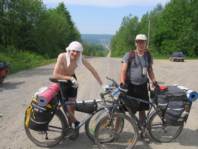 (From left:) Artem Sismekov and Ilia Yablonko. On the road Nizhniy Tagil - Serebryanka, at the Bolshoy Ural (in Russian - The Big Urals) pass on the border between Europe and Asia