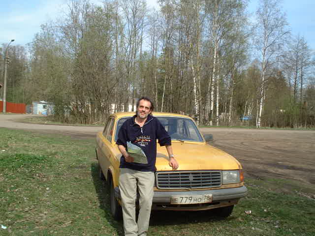 Capt. Peter in front the taxi, parked close to the beach