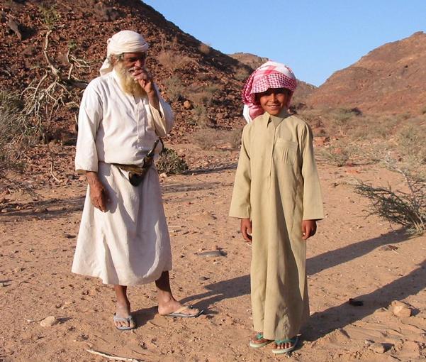 The Saudis that were sent to observe our movements. The old man supported his dagger, kanjar, and an AK rifle, while the young lad was the driver!