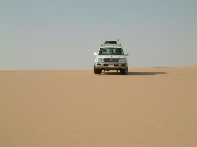 View at the confluence point, vehicle parked exactly at the point