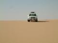 #8: View at the confluence point, vehicle parked exactly at the point