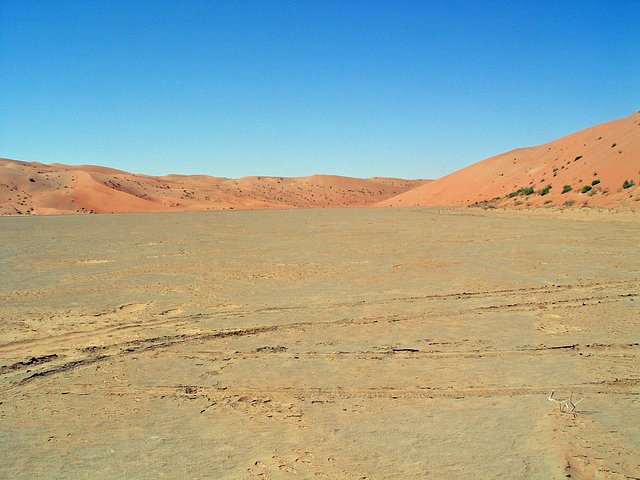 View looking west towards a relatively low saddle between dunefields. Our planned route and actual track crossed this saddle, with our maximum driving elevation reaching 358 feet (109 m).
