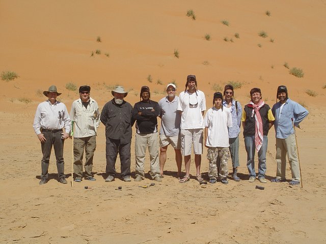 View of participants (Steve, Greg, Marek, Mushtaq, Tubby, Bert, Reef, Tom L., Tom O., and Mo), with 6 GPS's on the ground, all reading exact confluence location.  Elevation at the confluence is 238 ft above sea level.