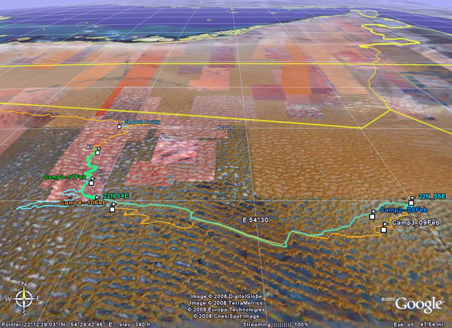 Google Earth perspective view of the confluence area, with vehicle tracks for the 4 day tour, camp sites labeled with the overnight date, and way point flags for 22N 54E and 22N 55E.