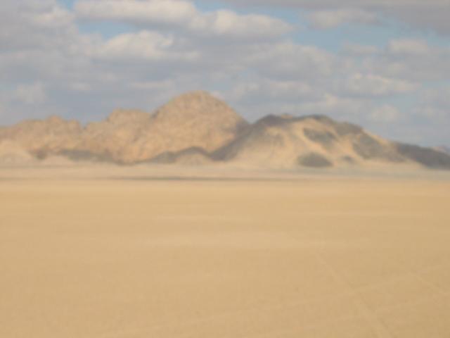 Our very fuzzy photo of the mountains to the East of the Confluence (sorry)