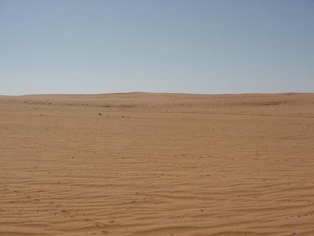 The confluence was situated in a wide sandy valley between lines of low sand dunes.