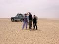 #4: The South view of group holding hats in the strong winds