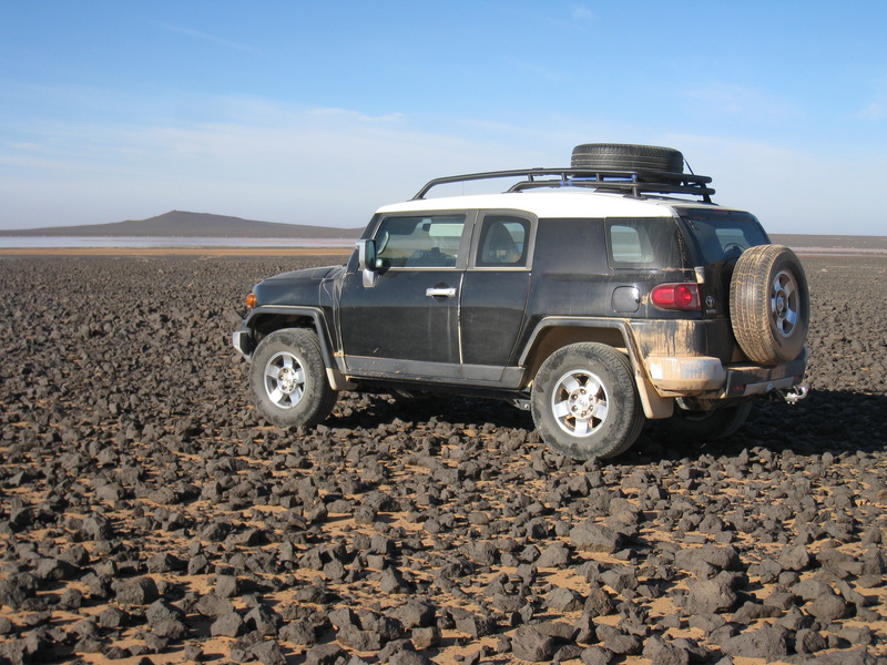 Driving on the black volcanic rocks