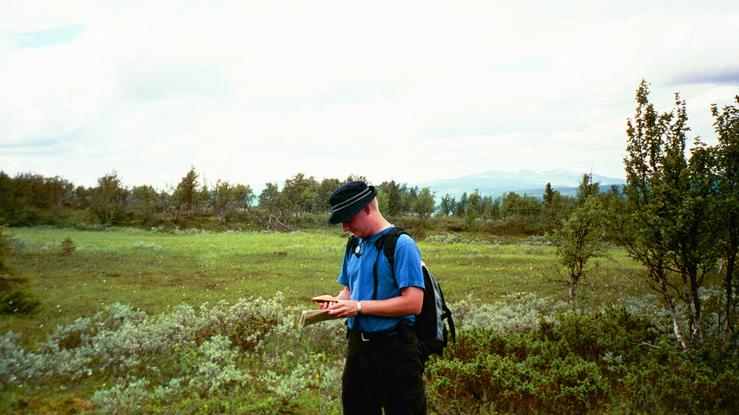 Me comparing the GPS to the map. About 5km from the point.