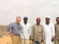 #5: The confluence hit team at 19N 30E, Neil Munro on left, Dr Osman el-Tom 3rd from left, on an uncomfortably hot late afternoon