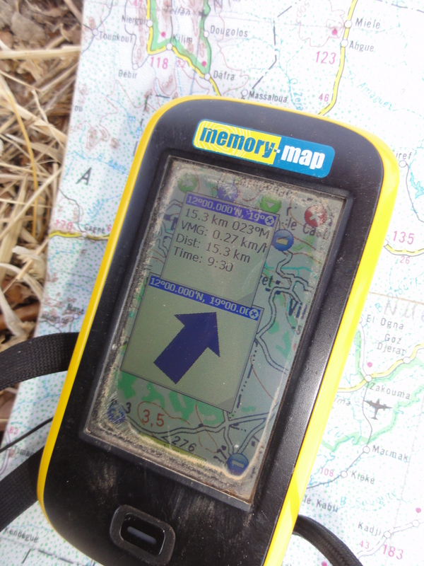 GPS receiver screen and road map at closest point near the village of Kilim