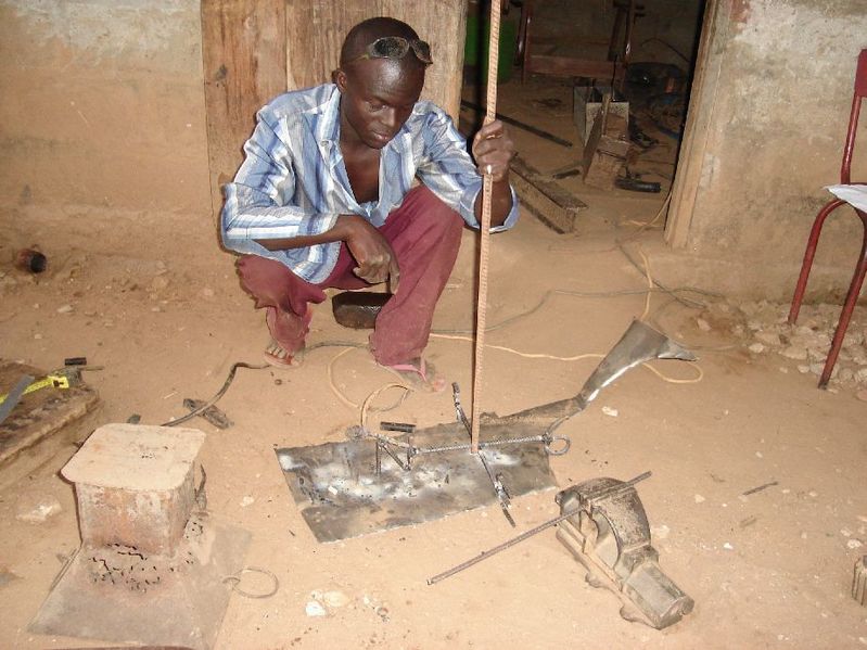 This is Yao welding the marker in his shop the day before the hike