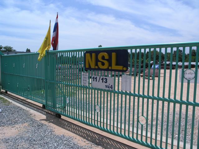 The closed gate to the steel pipe works