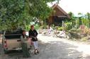 #8: Eddie and Wattanah at the entrance to the far, with pretty farm house in back.  95 meters to go