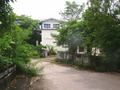 #10: Nearby bridge and school across the canal