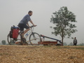 #9: Cyclist, Mobile Pump and Farmer