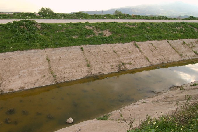 The confluence point is at the small boulder in the canal