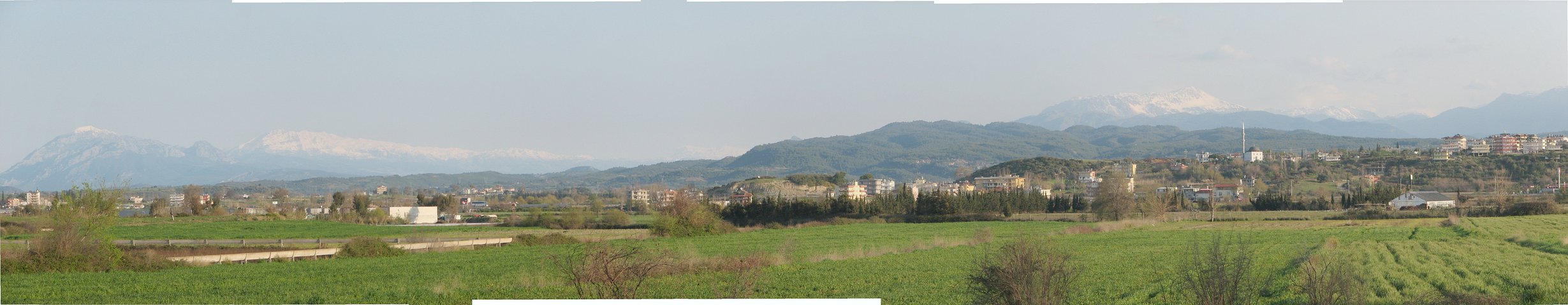 View of the coastal plain near Side and the Taurus mountains in the light of the rising sun