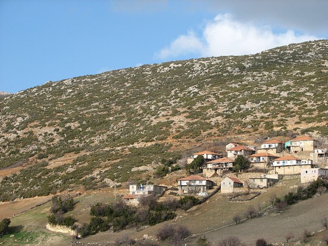 View of a small part of the "upper" Yeşilköy with the farmhouse near the centre and the Confluence hill in the background