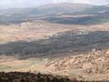 #11: View down on a small part of Derbent. The larger part of the village is outside the right edge of the picture, but hidden by a hill. My car is parked in the lower left corner of the picture