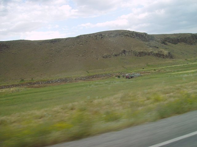 Work in fields and those mountains to be crossed