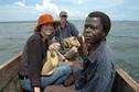 #6: Front of the boat at confluence point - Henry the guide, Linda, and Peter