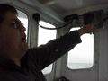 #9: Dave Turner, commercial fisherman and captain of the Sarah Louisa, points out some of the electronic features of the boat.