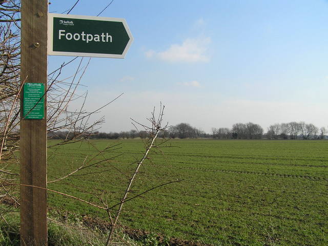 Footpath sign at the start of our walk to the confluence.  The confluence is below and to the right of the "h" in "footpath", where the right-most branch points skyward.