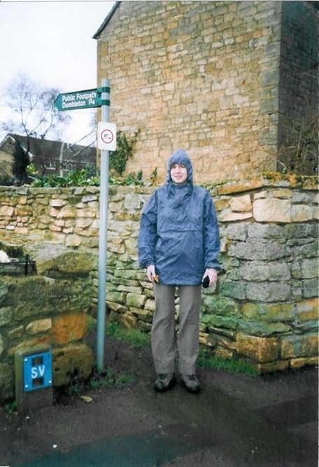 Dawn by the footpath signpost.