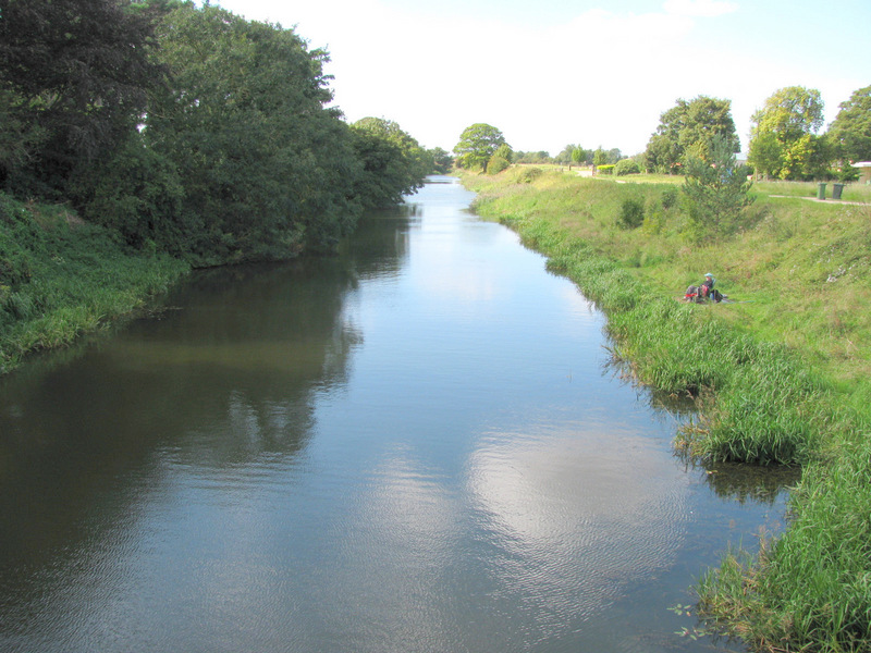 Cowbridge Drain and a fisherman seen West of Sibsey Road bridge.