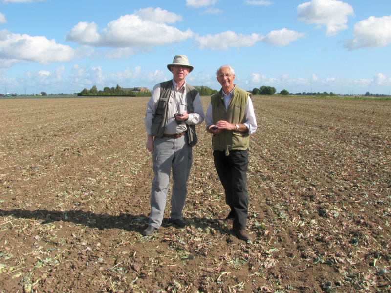 Alan and Gerald - two men out standing in their field.