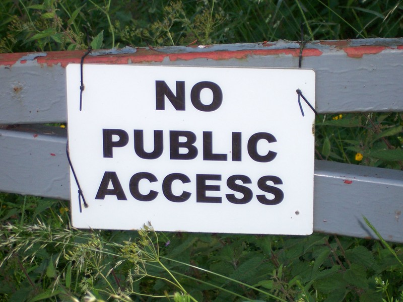 the sign on the gate at the start of the field access road