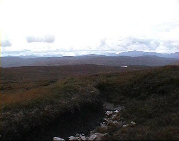 Looking south. Glimpse of Loch a' Chroisg (?)