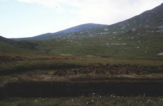 The walk in: Peats are stacked, drying for fuel