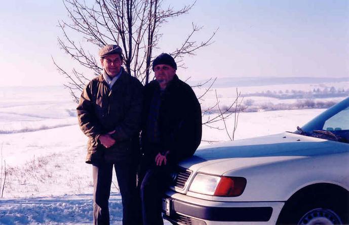 Yevhen and Vadim, on the roadway, about 200m north of the 50°N 24°E confluence.