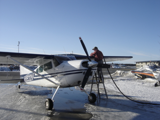 Larry refueling the plane