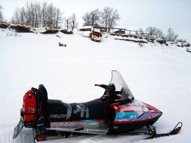 A truck ready to fall in the river at Akiak