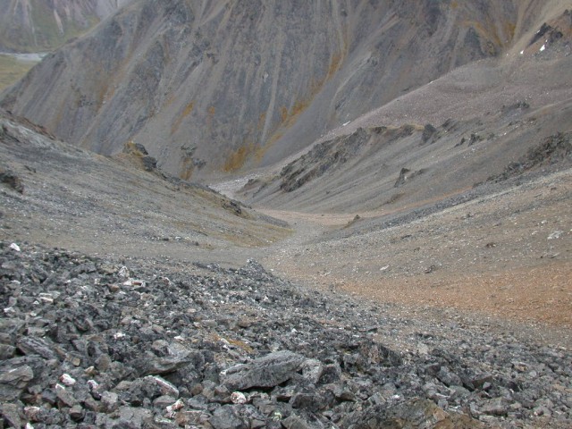  Steep scree slope dropping down from exact confluence