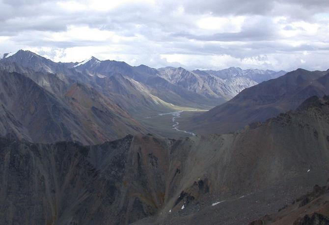 View East from confluence ridge to Sheenjek River, our camp at fork