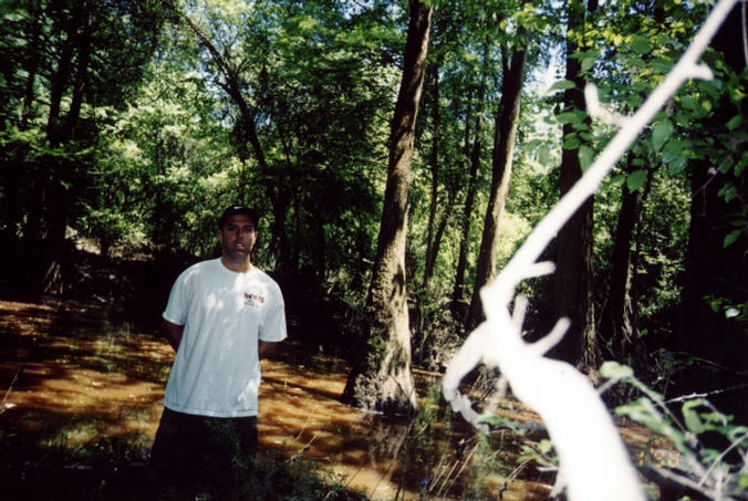 Here I'm standing on the confluence, which is on an island in the middle of the swamp. (Close-up of me.)