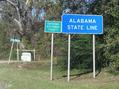 #6: Standing in Florida, looking at the Alabama sign, 3.5 km west of confluence.