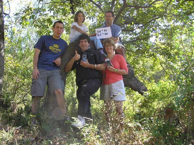 On tree:  Lilia Kerski and Tom Luther.  On ground:  Michael Chinneck, Joseph Kerski, and Shannon White, all feeling centered.