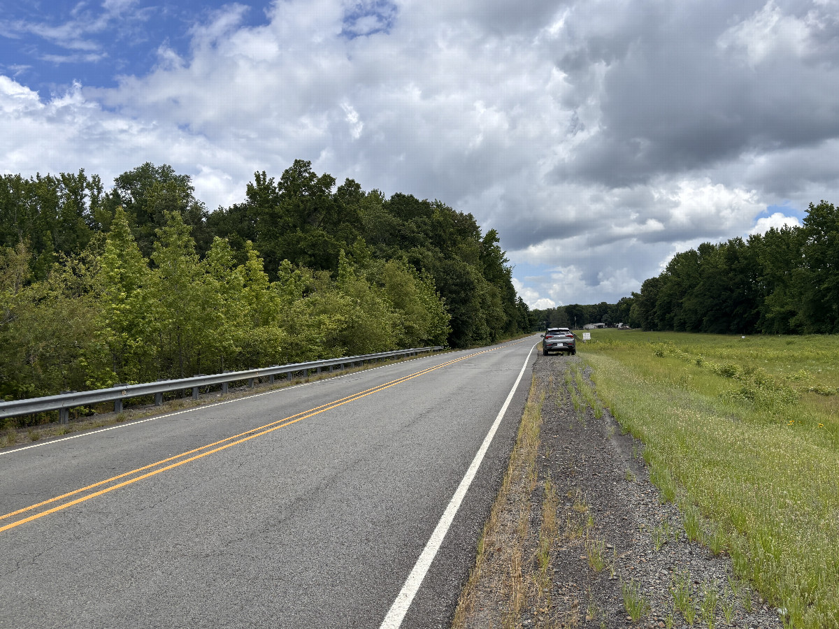 Closest road to the confluence point, looking northeast.