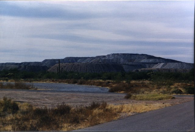 Giant mine dumps between us and the confluence.